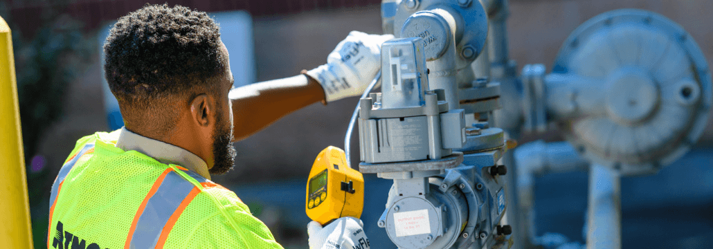 Image of an Atmos Energy technician working on a natural gas line